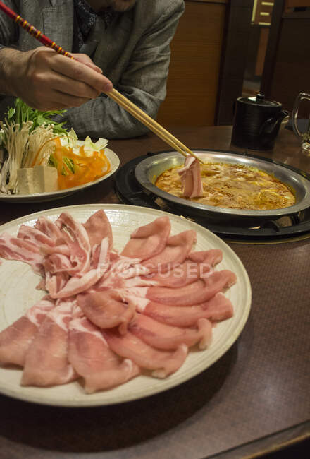 Shabu-shabu over a hot plate (Japan) — Stock Photo
