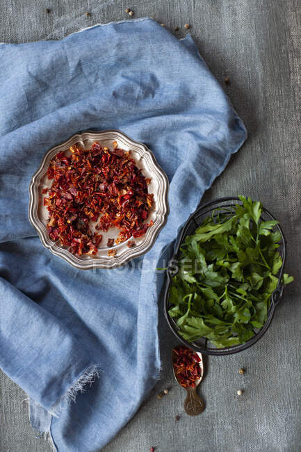 Dried paprika and fresh coriander — Stock Photo