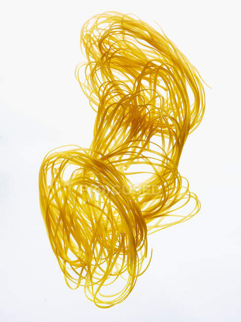 Close-up shot of delicious Linguine on a White Background — Stock Photo