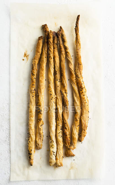 Puff pastry twist on white plate — Stock Photo