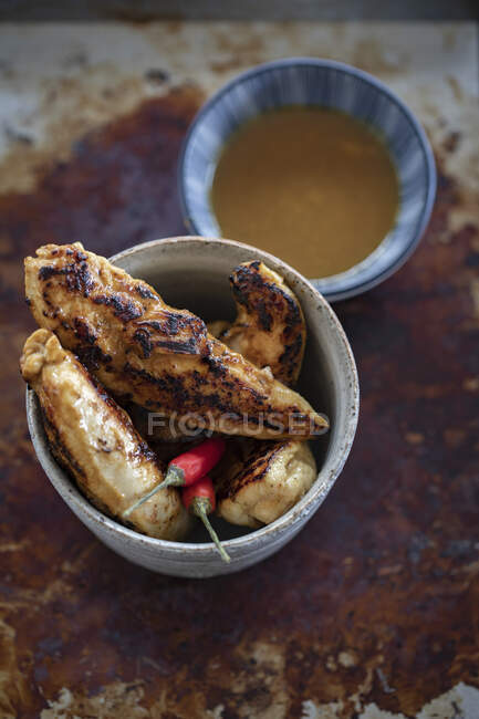 Chicken fillets with a dip — Stock Photo