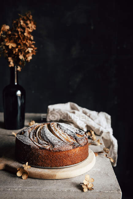 Banana bread on table against a black background — Stock Photo