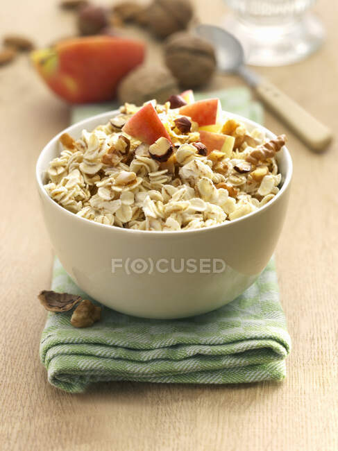 Muesli with nuts and apples — Stock Photo