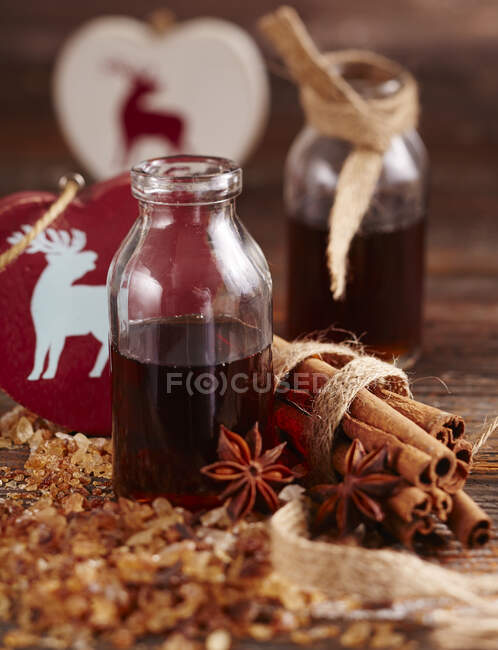 Homemade syrup with cinnamon, star anise and rock sugar — Stock Photo