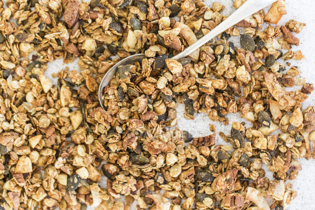 Crispy baked muesli with almonds and pecan nuts — Stock Photo