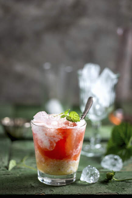Strawberry Kiss cocktail made with strawberry pure, cream and orange juice — Stock Photo