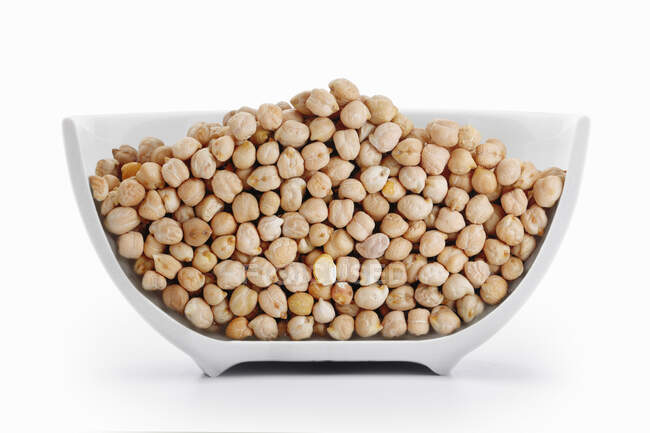 Chickpeas in a cross-cut bowl — Stock Photo