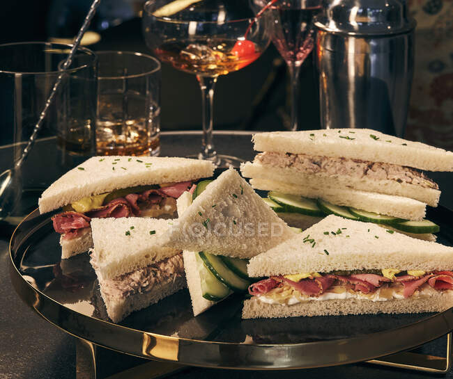 Various sandwiches on a tray — Stock Photo