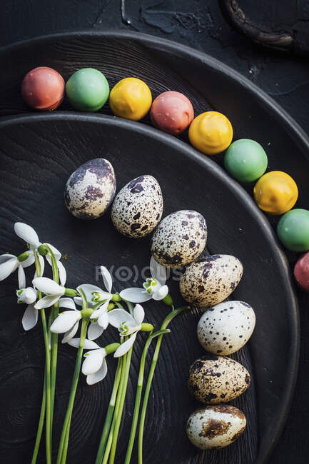 Easter eggs and candies — Stock Photo