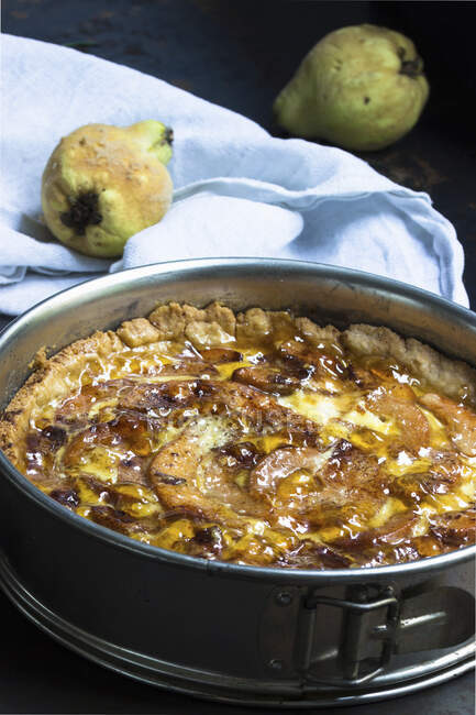 Quince cake, glazed with quince jelly, in a spring form pan — Stock Photo
