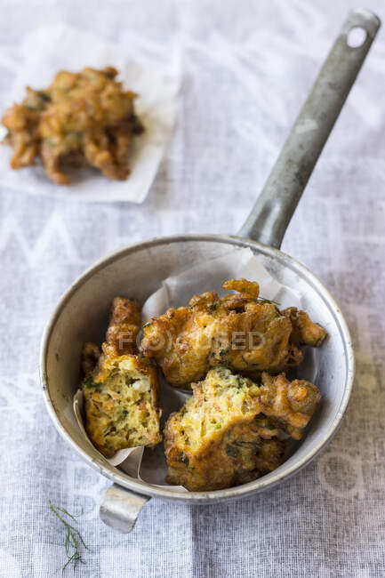 Carrot fritters with parslay and dill — Stock Photo