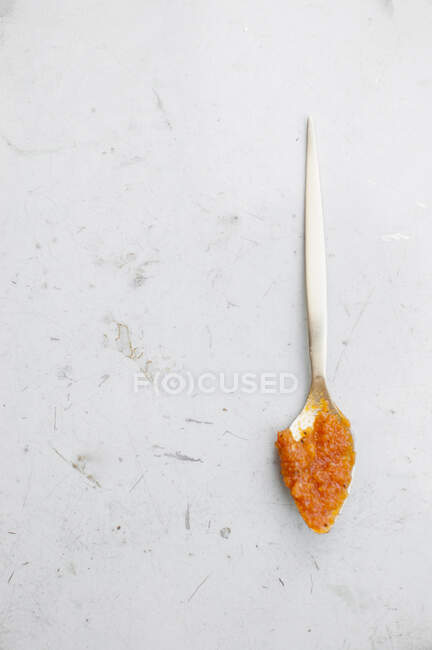 Carrot habanero sauce on a spoon — Stock Photo