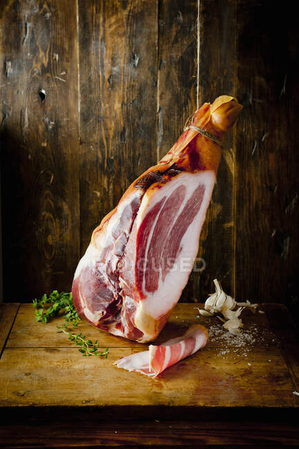 Prosciutto on table close-up view — Stock Photo