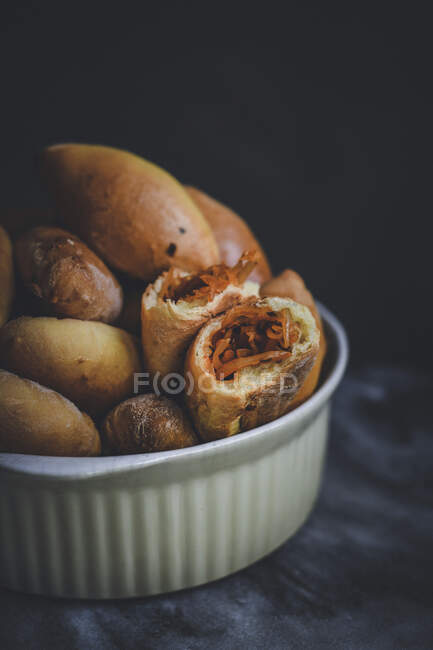 Savoury pirogi filled with white cabbage — Stock Photo