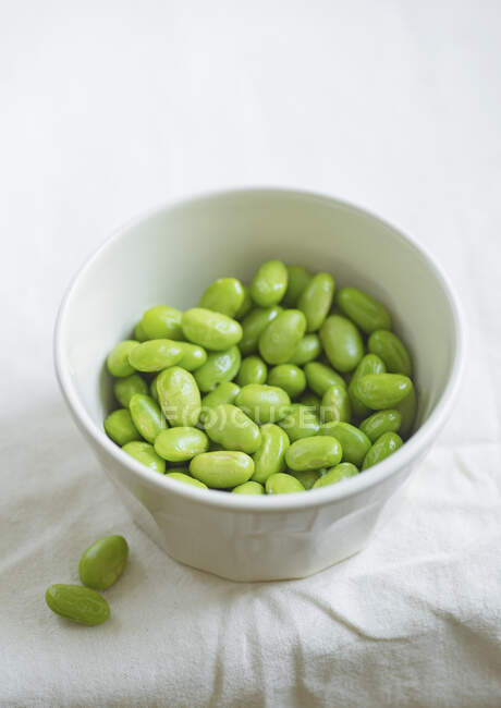 Edamame beans on bowl on a table - foto de stock