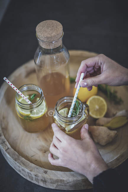 Lemon tea with ginger and rosemary — Stock Photo