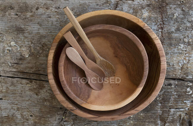 Wooden Bowls on Rustic Wood Background — Stock Photo