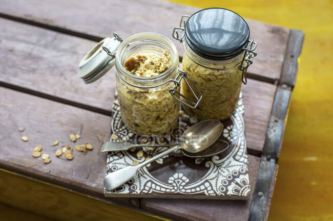 Bircher muesli in glass jars — Stock Photo