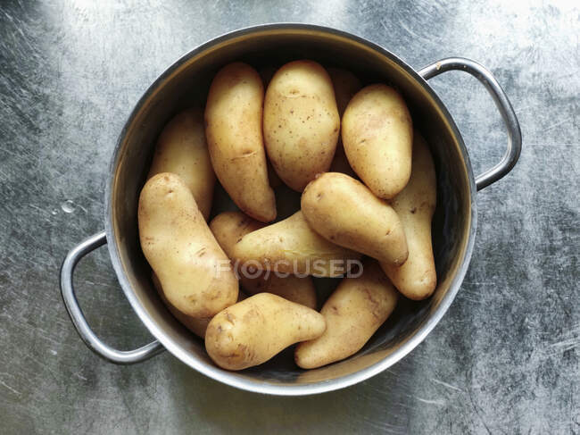 Potatoes in a saucepan — Stock Photo