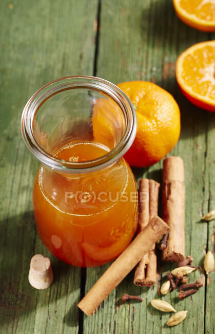 Homemade mandarin spice syrup with cinnamon — Stock Photo