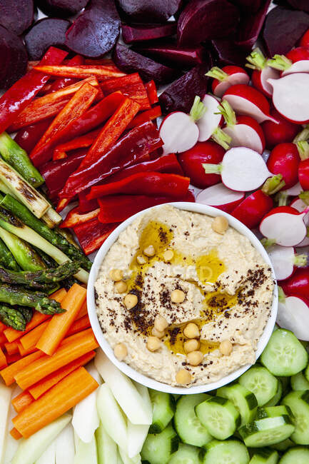 Hummus with various vegetables — Stock Photo
