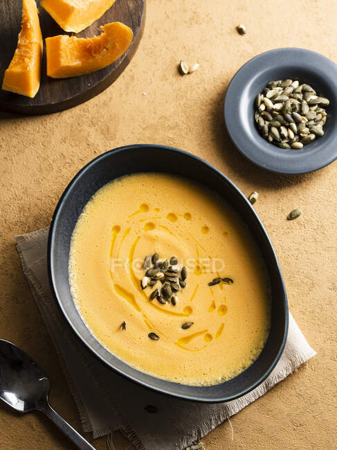 Roasted pumpkin soup with seeds — Stock Photo