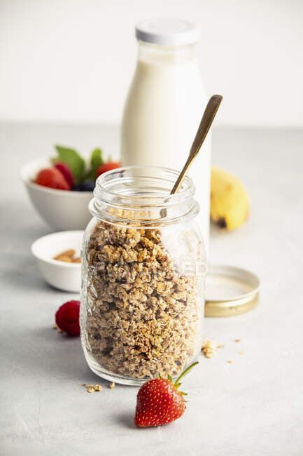 Homemade granola in a glass jar — Stock Photo
