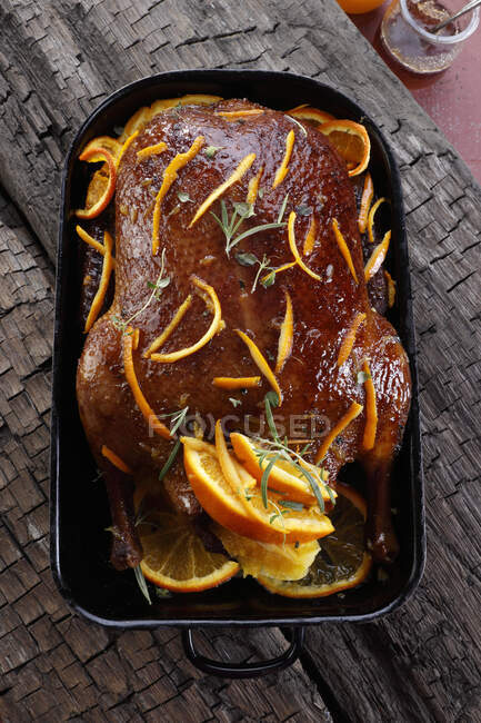 Roasted duck with oranges, top view — Stock Photo
