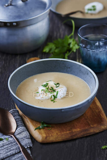 Chestnut soup with milk foam — Stock Photo