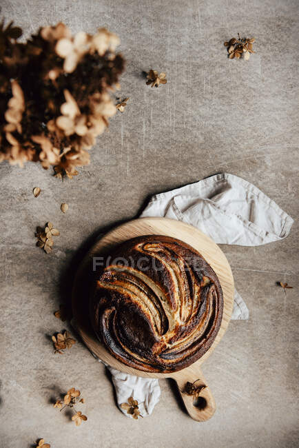 Banana bread on a wooden board top view — Stock Photo