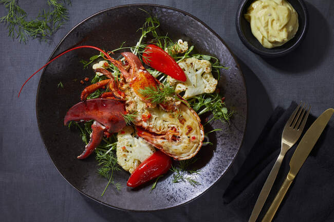 Lobster with chili peppers and cauliflower — Stock Photo
