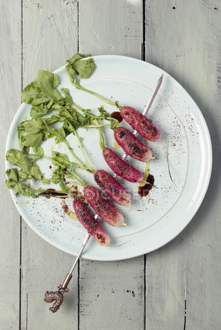 Grilled organic radish on skewer — Stock Photo
