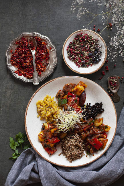 Ratatouille with lentils, buckwheat and pearl — Stock Photo