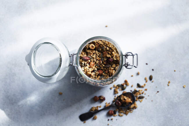 Home-made porridge in flip-top glass jar — Stock Photo