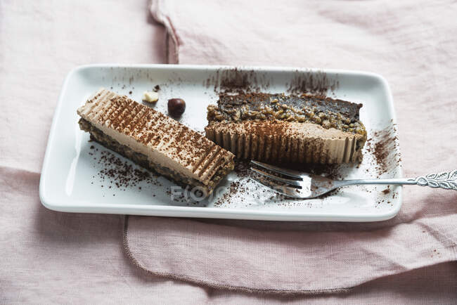 Vegan chocolate cake with sunflower seeds, hazelnut caramel and chocolate cream — Stock Photo