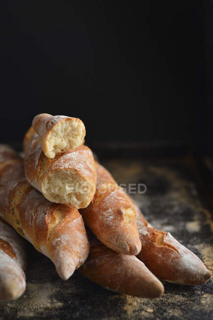 French baguettes dark background — Stock Photo
