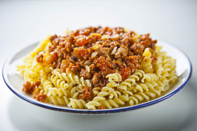 Fusilli with minced meat sauce — Stock Photo