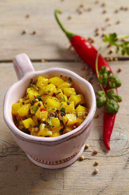Mango pickles with spices and chili — Stock Photo