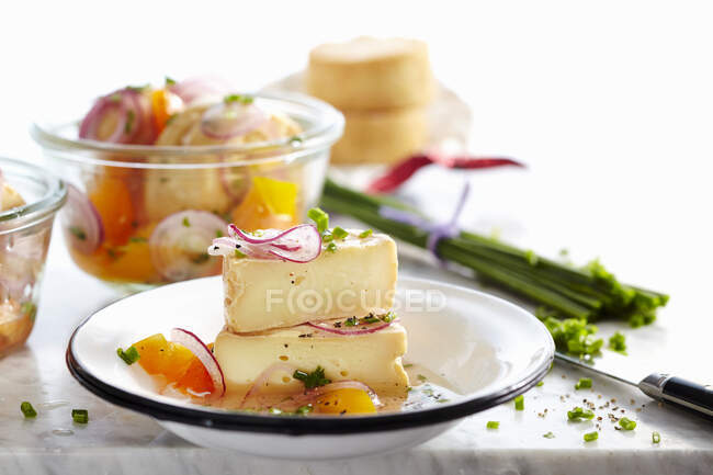Marinated wine cheese with herbs and peppers — Stock Photo