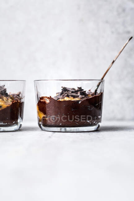 Fast avocado chocolate mousse with passion fruit — Stock Photo