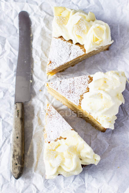 Swedish marzipan cake pieces with knife — Stock Photo