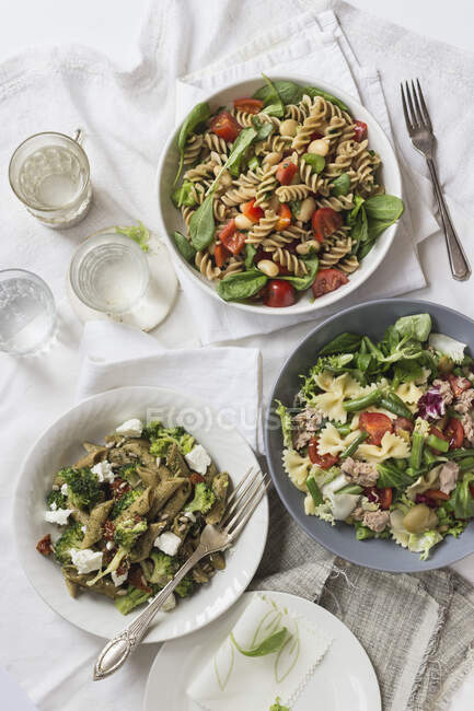 Three green pasta salads — Stock Photo