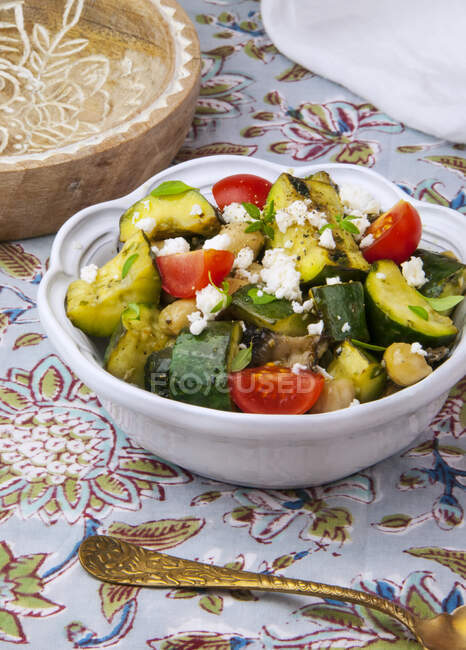 Grilled vegetables salad with feta in white bowl — Stock Photo