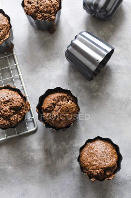Cocoa hazelnut friands baked in canele forms — Stock Photo