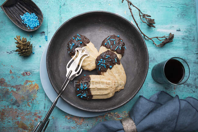 Vegan shortbread cookies with dark chocolate and sprinkles — Stock Photo