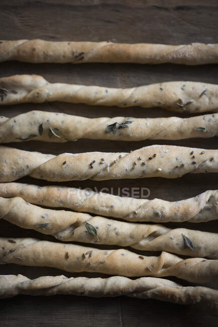 Homemade grissini with thyme, chia seeds and cumin — Stock Photo