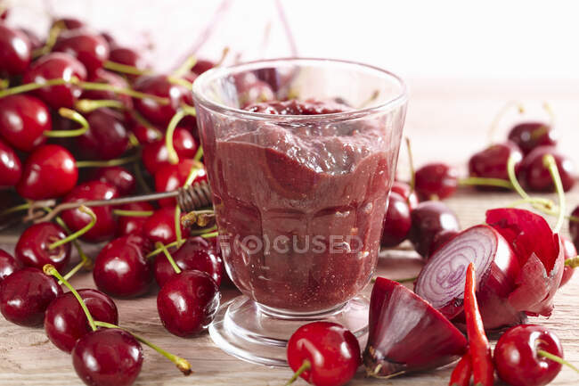 Cherry and onion marmalade in a glass — Stock Photo