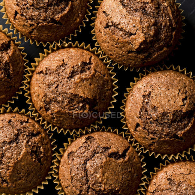 Close-up shot of delicious Chocolate muffins (seen from above) — Stock Photo