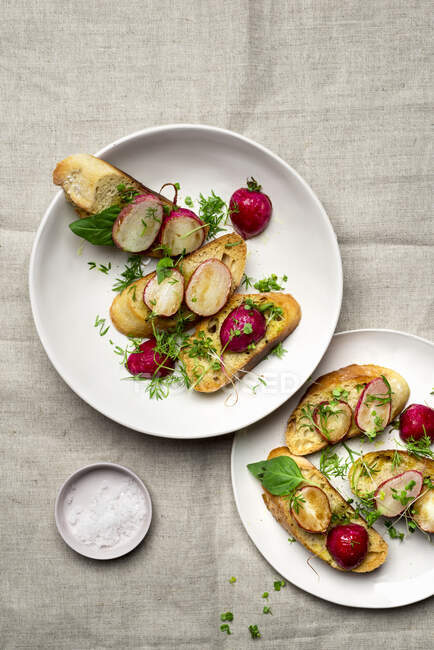 Toasted bread with fried radishes — Stock Photo