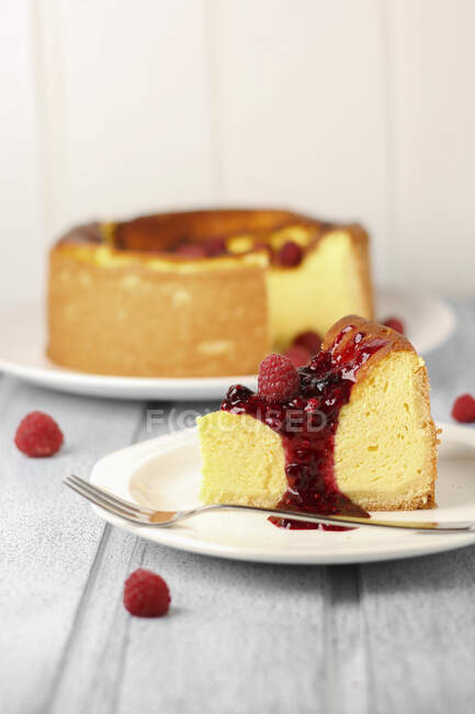 Cheesecake with a berry sauce — Stock Photo